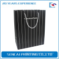 Wholesale various sizes man clothing packaging paper shopping bag